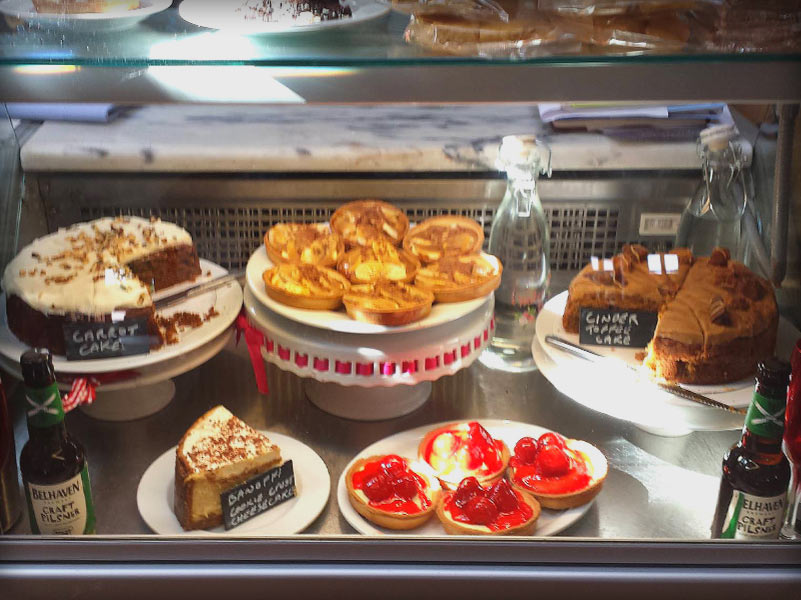 Shop Counter fridges with Carrot Cake, Ginger Toffee Cake and Strawberry Tarts