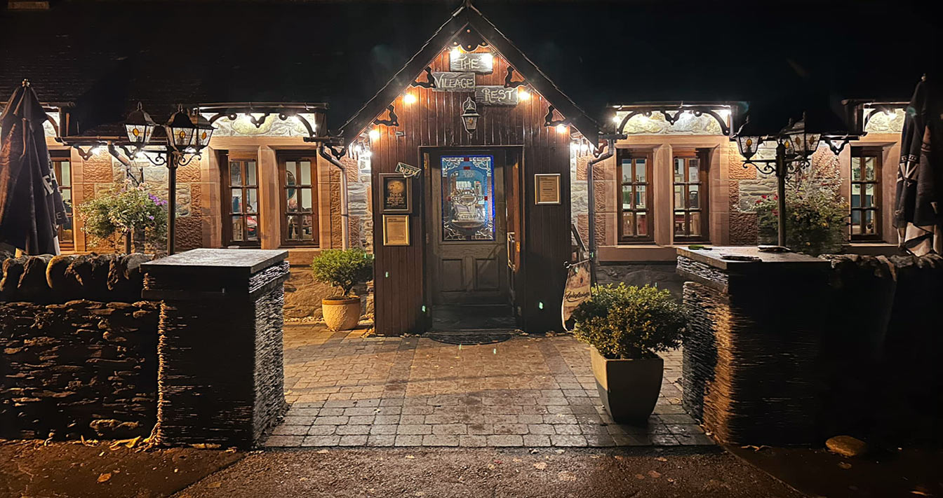 The Village Rest building by night